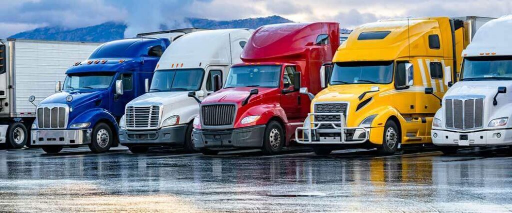 The benefits of last mile delivery are often achieved via semi trucks such as the ones depicted in this picture.